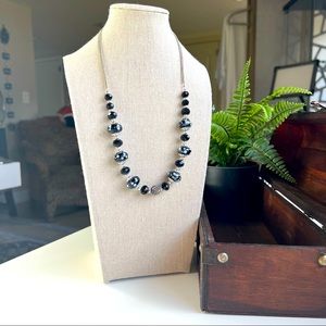 Black and silver beaded necklace.